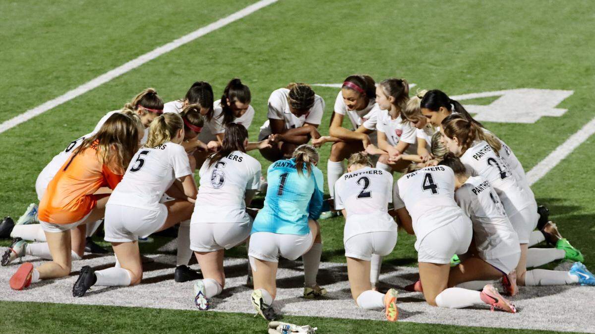 Colleyville Heritage girls’ soccer huddles up during a district game vs. at Denton High School in Denton, Texas on Friday, Feb. 28, 2025.