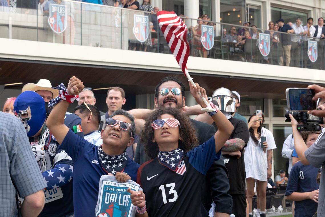 Gilbert and Caleb Aguilera react to the announcement of Dallas-Fort Worth Metroplex as a host in the 2026 FIFA World Cup on Thursday, June 16, 2022, at the AT&T Discovery Center in Dallas, Texas.