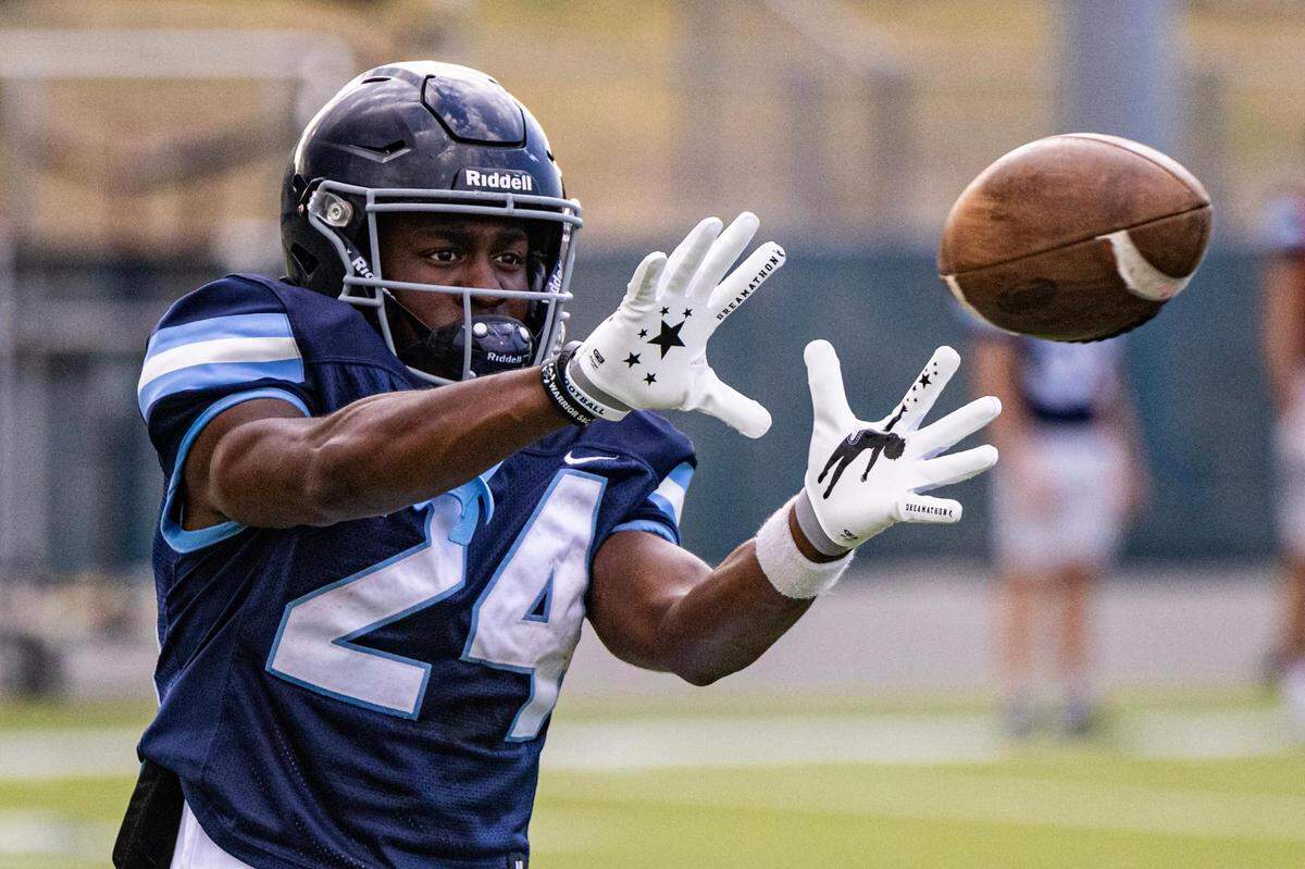 Liberty Christian wide receiver Quinton Brown (24) catches a pass during a scrimmage for football practice at Warrior Stadium at Liberty Christian School in Argyle, Texas on Tuesday, Aug. 15, 2023.