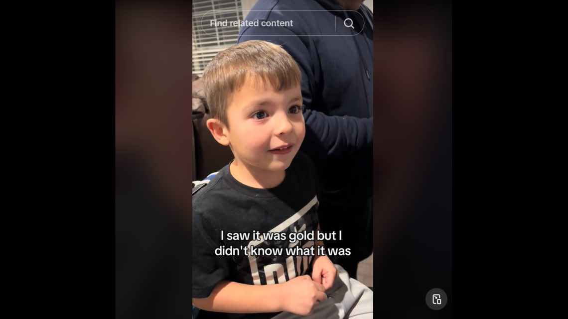 Young Champ’s face upon finding the rare card.