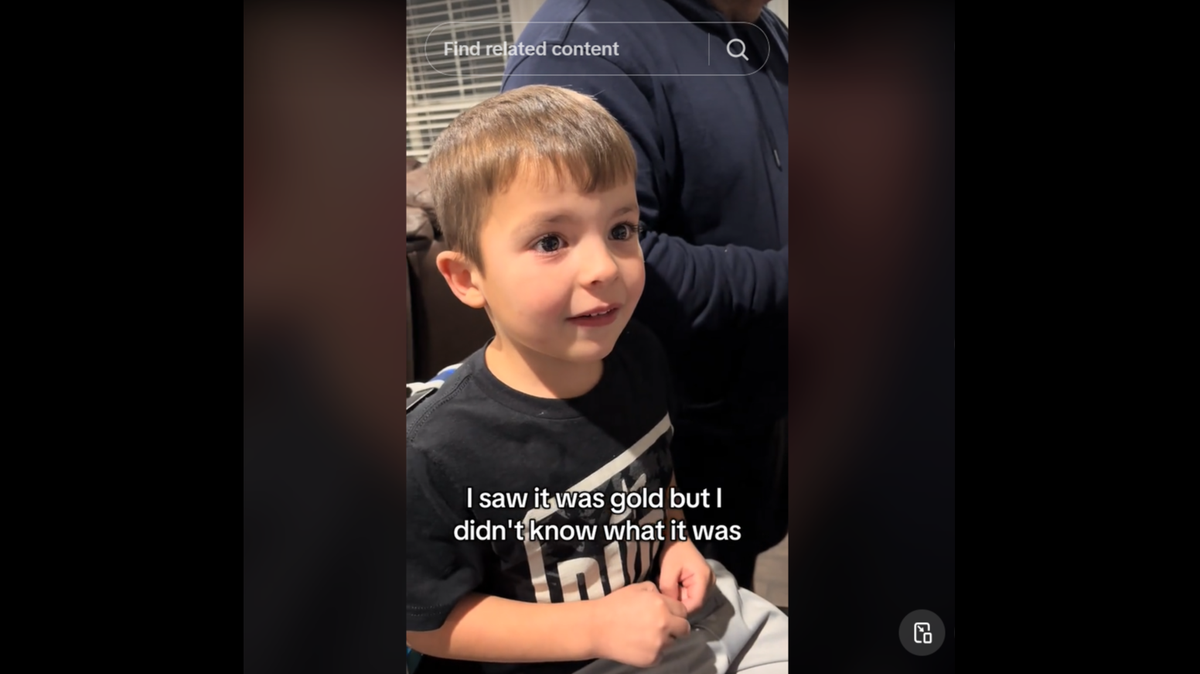 Young Champ’s face upon finding the rare card.