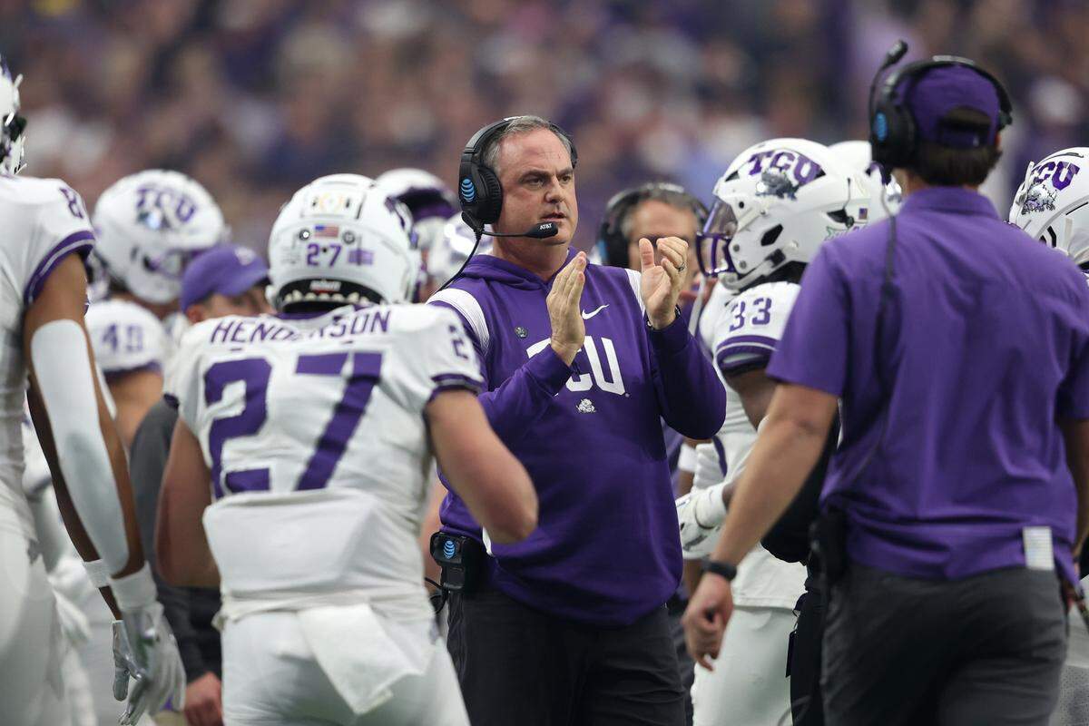 TCU head coach Sonny Dykes claps after a second touchdown from his team during their game against Michigan at the Vrbo Fiesta Bowl in Glendale, Ariz., on Saturday, December 31, 2022.