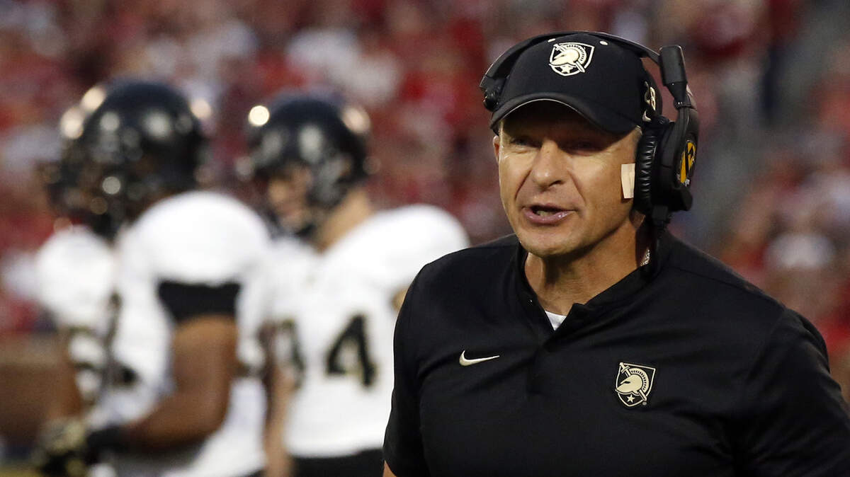 FILE- In this Sept. 22, 2018, file photo, Army head coach Jeff Monken shouts in the first half of an NCAA college football game against Oklahoma in Norman, Okla. For all the complaints about too many bowls, this is the second straight season there will be more bowl eligible teams (at least 81) than available bids (78). That has put No. 23 Army and fellow football independent BYU (6-6), another school with a large national following, in the strange position of tracking results from all over the country in recent weeks and heading into college football’s selection Sunday with postseason plans more uncertain than most. (AP Photo/Sue Ogrocki, File)