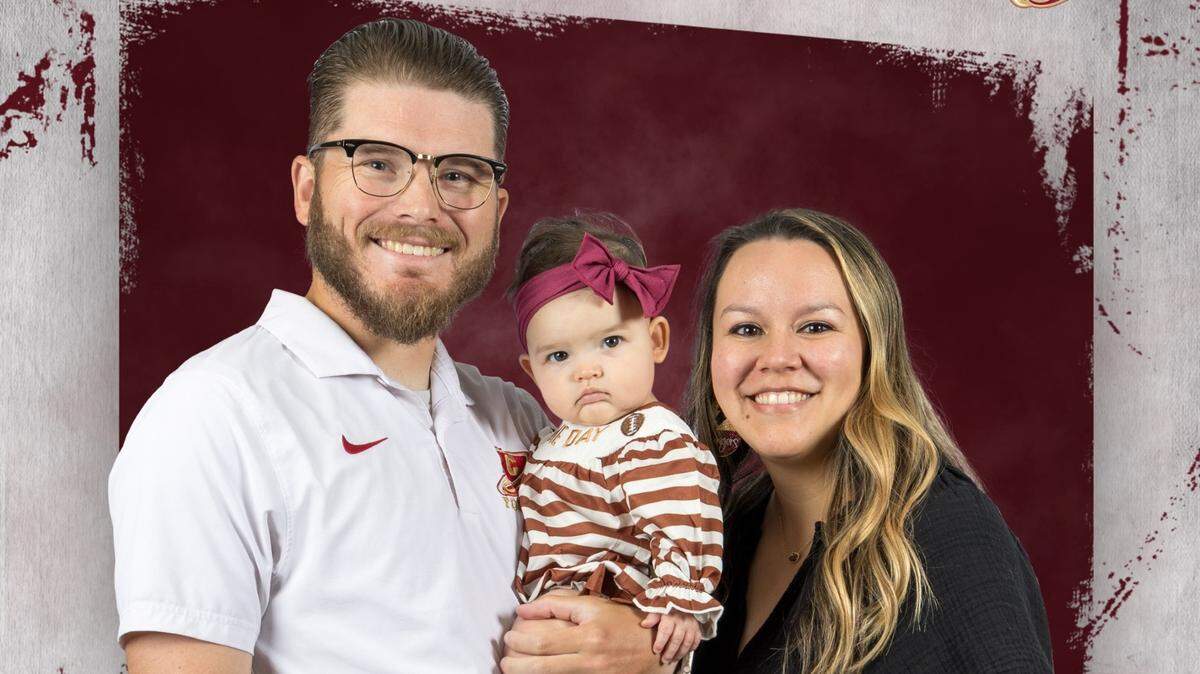 Keller Central assistant coach Derek Hill, who battles cystic fibrosis daily, with his wife, LaNaya, and their daughter, Emersyn.
