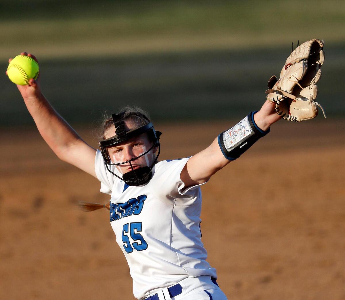 Burleson Centennial pitcher Bailey Lindemuth (55) throws in the top of the second during a UIL 5A Region 1 quarter-final playoff softball name at Spartans Softball Field in Mansfield, Texas, Wednesday, May 11, 2022. Centennial defeated Northwest 7-5 in game one. Game two will be at Northwest High School Thursday with game three at Weatherford High School if necessary. (Special to the Star-Telegram Bob Booth)