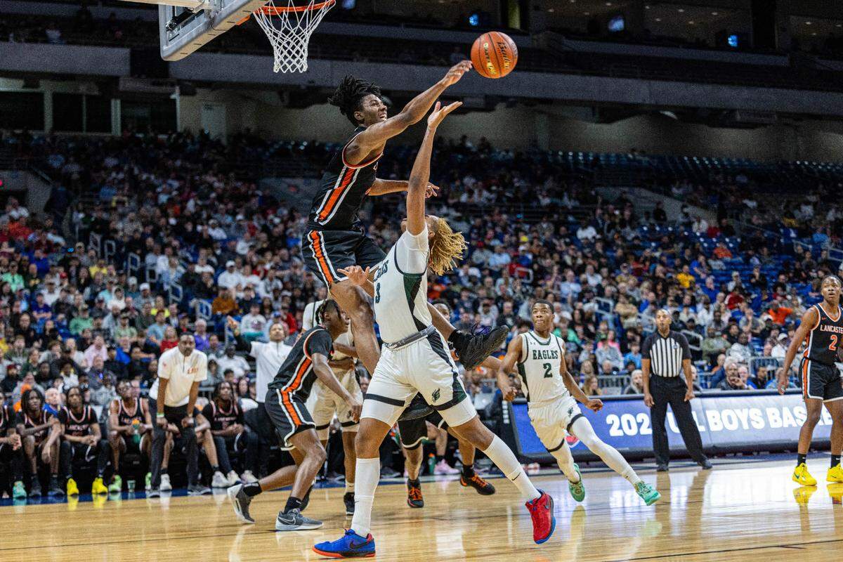 Lancaster’s Dillon Battie skys to block the shot of Killeen Ellison’s Nasaun Parker in the Class 5A state championship game on Saturday, March 9, 2024 at the Alamodome in San Antonio, Texas. Lancaster defeated Ellison 59-30.