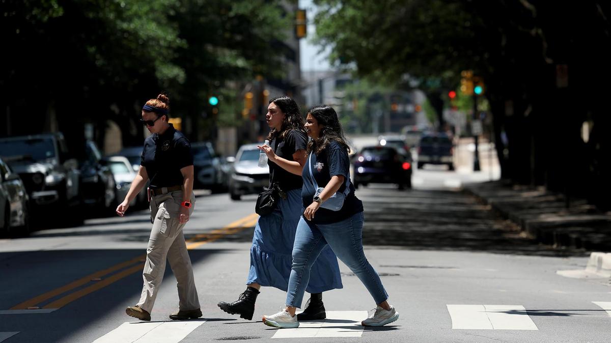 People walk along Seventh Street in downtown Fort Worth in June. Foot traffic is up 25% since 2022, according to Downtown Fort Worth Inc.