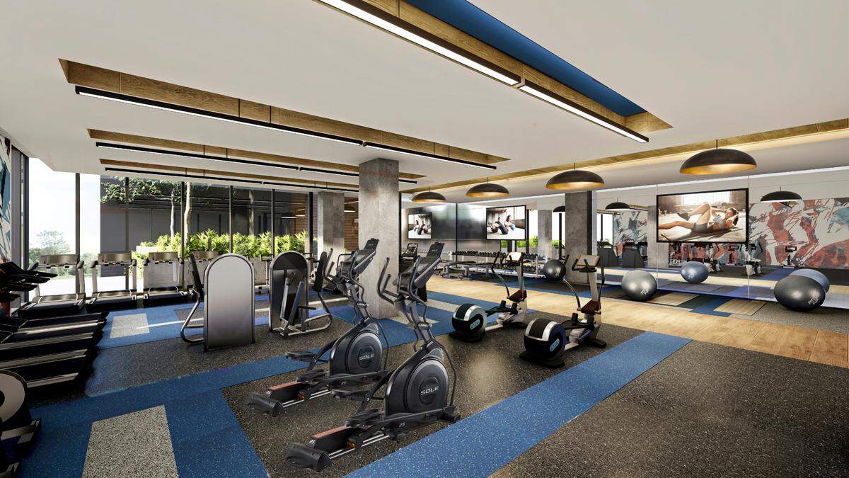 A rendering of the complex's fitness center shows four elliptical workout machines, more than three treadmills, weights and exercise balls.