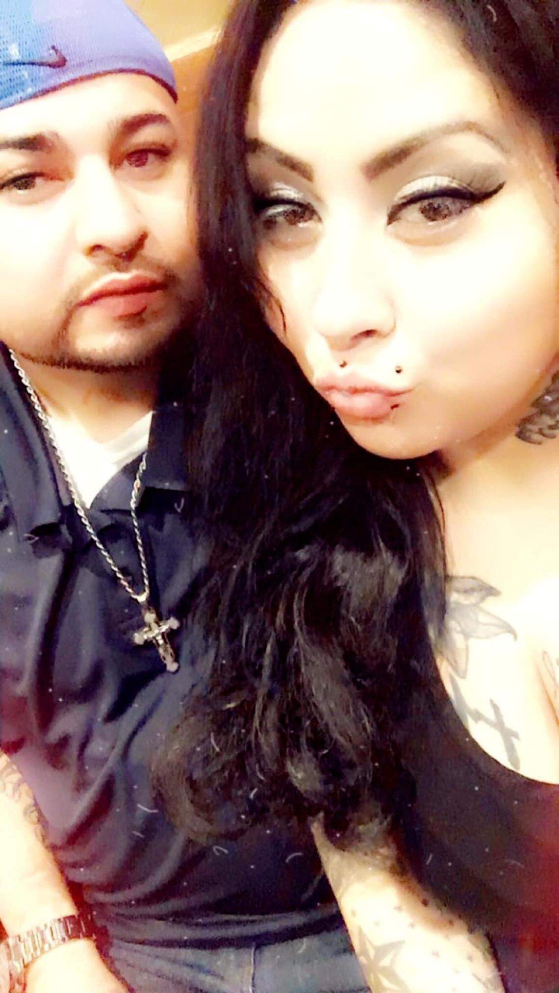 Sandra Castro (right) and Manuel Castro (left) pose together for a photo. Manuel, who first met Sandra when they were kids, has taken care of her with her various chronic conditions and her months battling symptoms from the coronavirus.