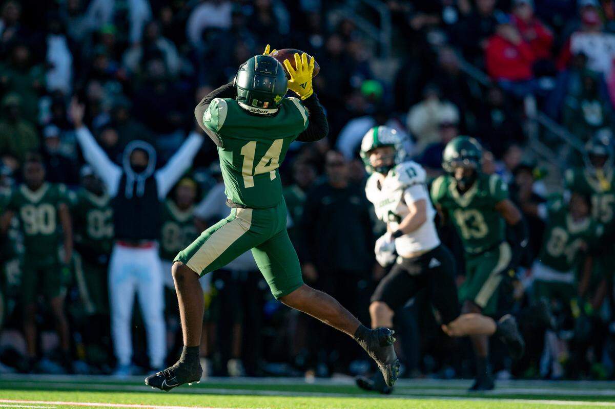 DeSoto Wide receiver Tristan Bailey hauls in a touchdown pass in a state semifinal game against Southlake Carroll in Allen, Texas on Dec. 9, 2023.