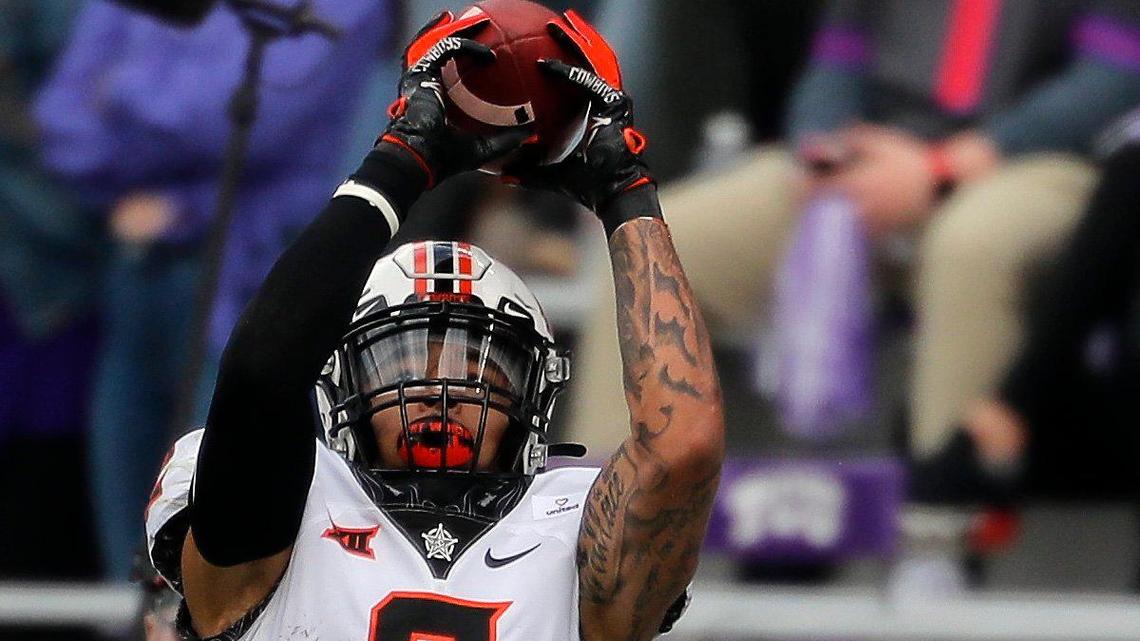 Oklahoma State wide receiver Tylan Wallace (2) grabs a short pass in the first half of a NCAA football game at Amon G. Carter Stadium in Fort Worth, Texas, Saturday, Dec. 05, 2020. The OSU Cowboys led 13-7 at the half. (Special to the Star-Telegram Bob Booth)
