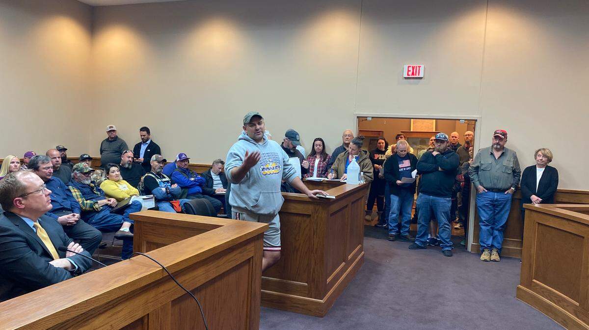Godley resident Michael Strickland speaks during a city council meeting on Dec. 7, 2021.
