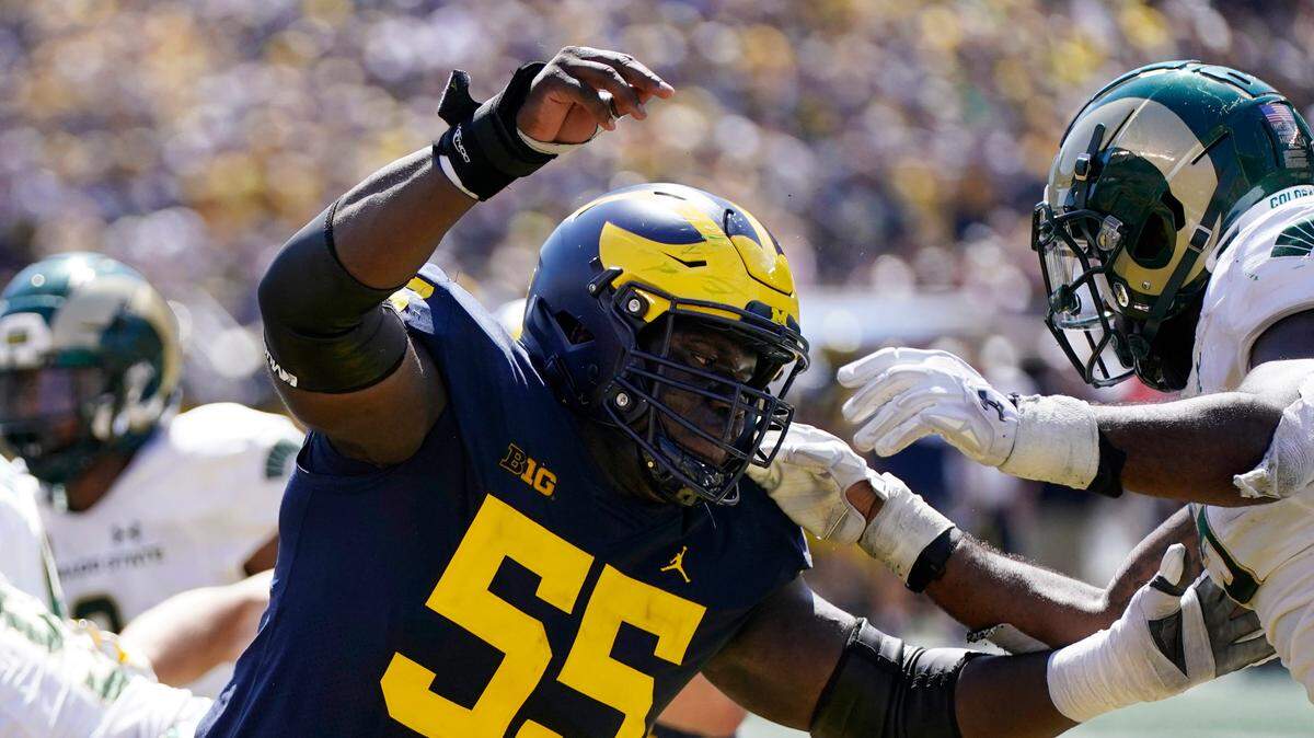 Michigan award-winning center Olusegun Oluwatimi plays during a game earlier this season. He and the Wolverines face TCU on Dec. 31.