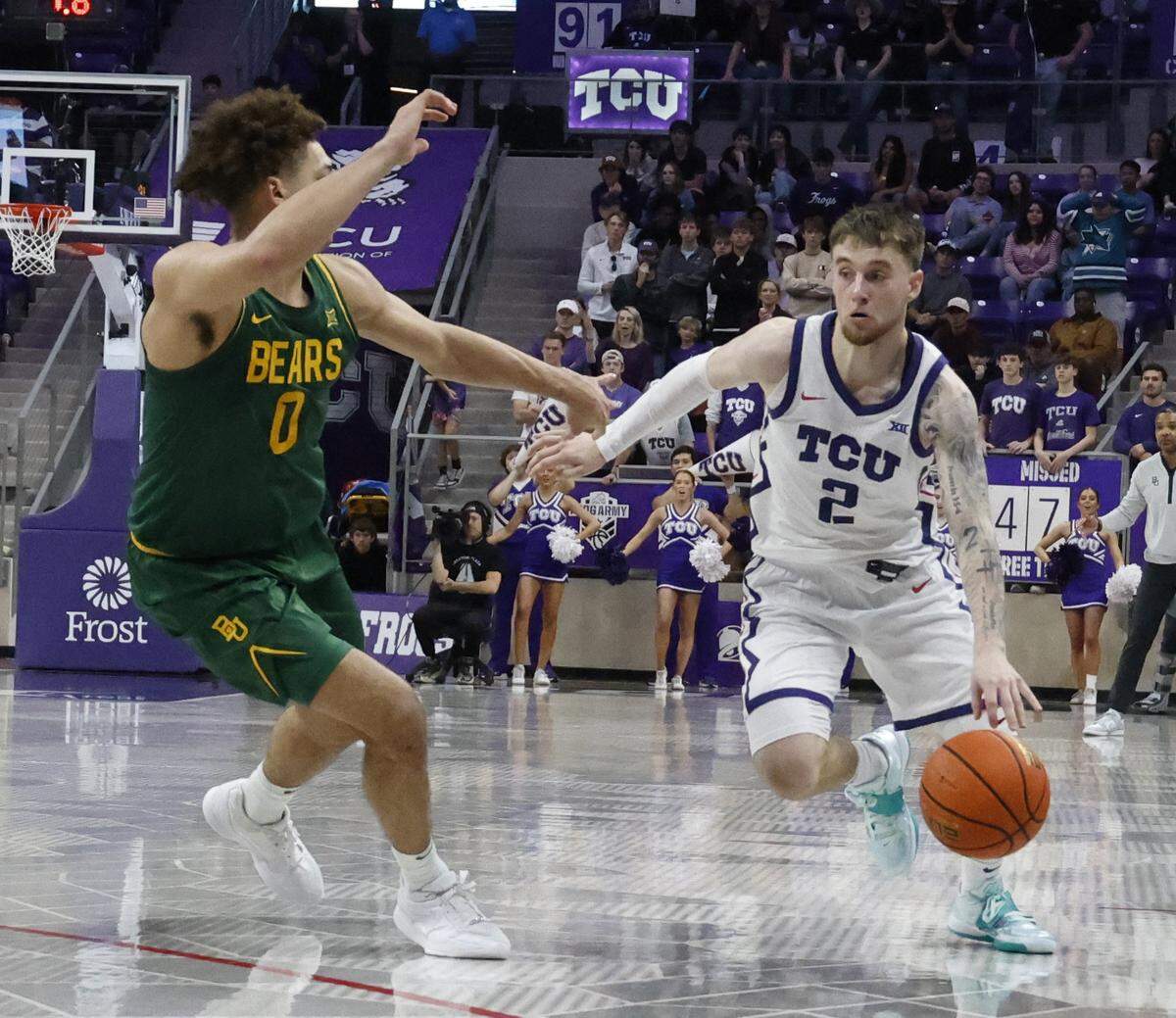 TCU guard Brock Harding (2) drives against Baylor guard Dan Skillings Jr. (0) during the second half of a NCAA basketball game between Baylor University and TCU at Schollmaier Arena in Fort Worth, Texas, Saturday Jan. 03, 2026