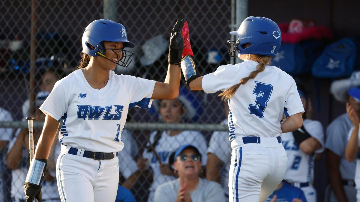 Joshua third baseman Leilanie Sam (6) congratulates center fielder Zaylee Masters (3) after Masters scored during a UIL 5A D2 bi-district softball playoff game at Eagle Softball Field in Crowley, Texas, Thursday, Apr. 24, 2025.
