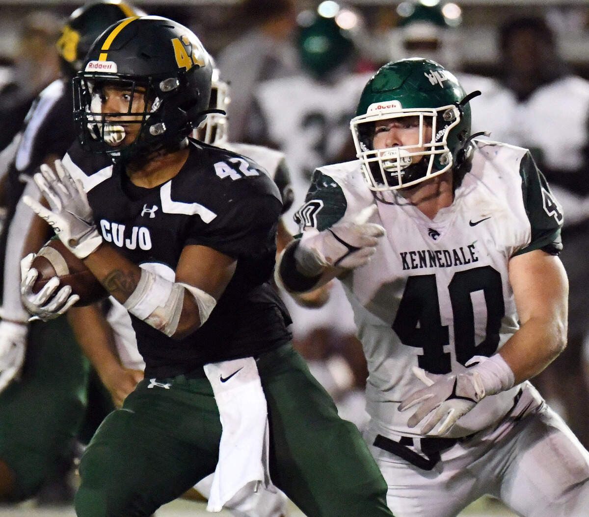 Kennedale’s RJ Pepper, right, chases Western Hills’ Jason Green as he runs out of the backfield in the fourth quarter of their District 6-4A Division 1 football game on Thursday, October 7, 2021 at Farrington Field in Fort Worth, Texas. Special/Bob Haynes