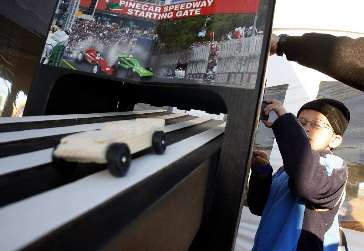 Nov. 15, 2008: Ryan Seltzer, 8, of Cub Scout Troop 937 of Southlake, tests his pinewood derby car at Council Camporee at Texas Motor Speedway.