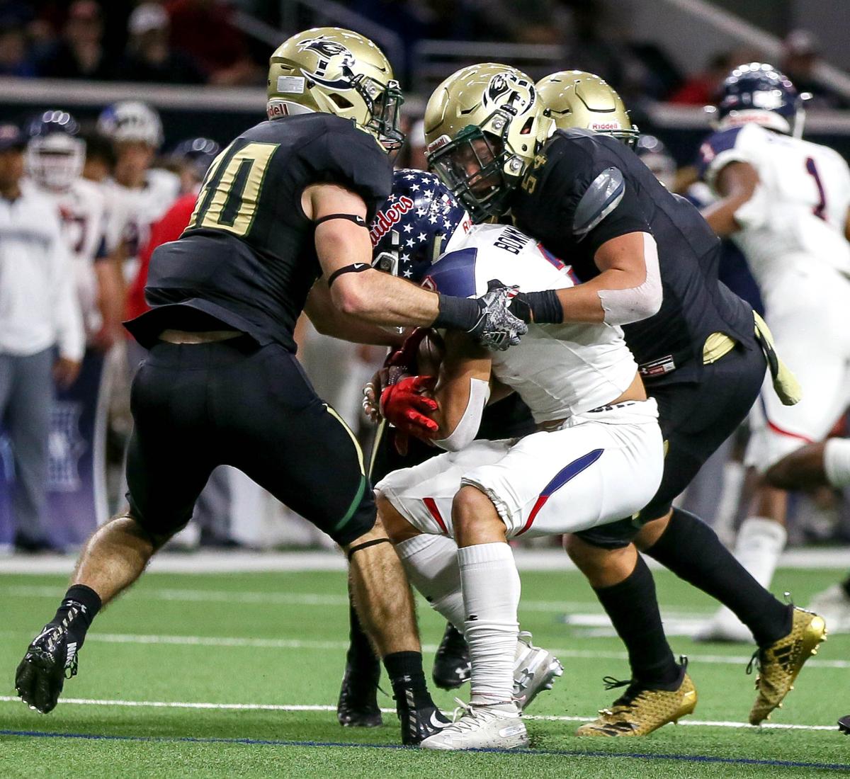The Birdville defense stuff Denton Ryan wide receiver Billy Bowman Jr (2) during the first half, Saturday night, December 8, 2018 in the 5A Division I quarterfinal playoff game played at the Ford Center in Frisco, TX.