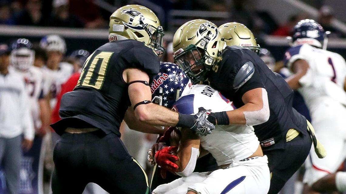 The Birdville defense stuff Denton Ryan wide receiver Billy Bowman Jr (2) during the first half, Saturday night, December 8, 2018 in the 5A Division I quarterfinal playoff game played at the Ford Center in Frisco, TX.