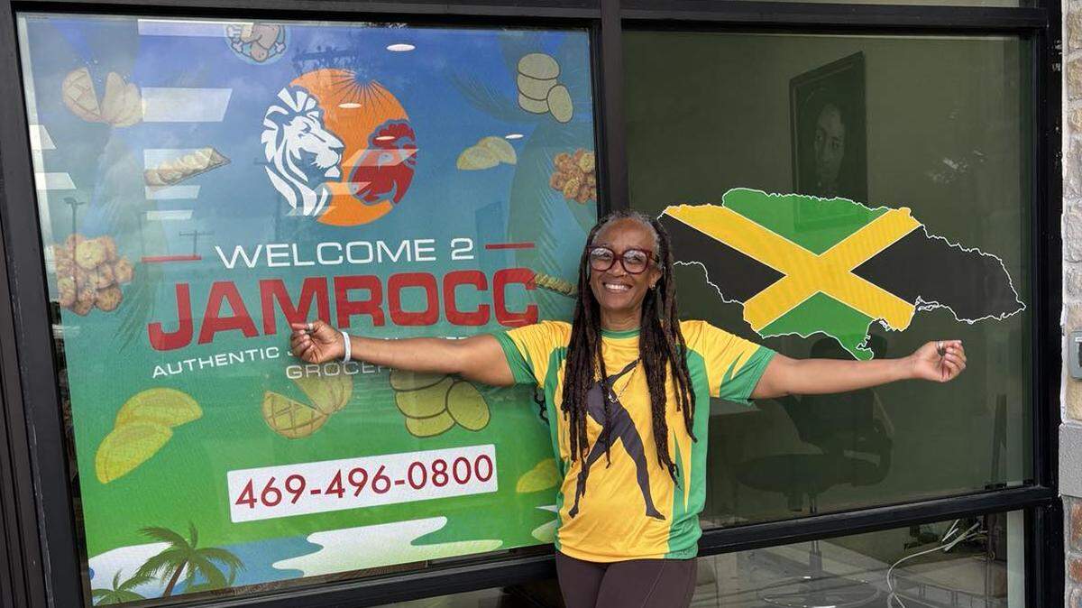 Pauline Thompson stands outside of her new Jamaican grocery store, Jamrocc, ahead of its grand opening in Fort Worth. The store is the first of its kind in the city, offering Caribbean groceries and grab and-go meals.
