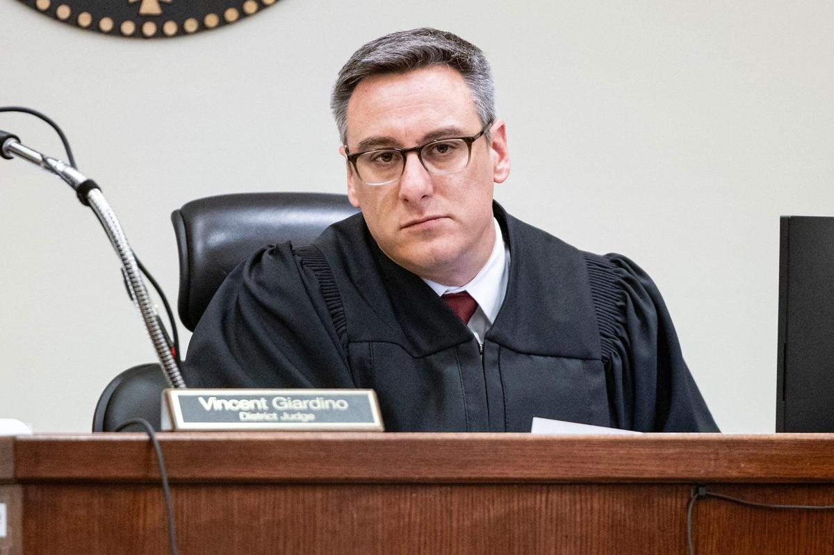 Judge Vincent Giardino listens to the defense attorneys during the capital murder trial of Jacoby Roberts in the 369th District Court at the Tim Curry Criminal Justice Center in Fort Worth on Thursday, July 24. Roberts shot his cousin to death in a robbery in Fort Worth.
