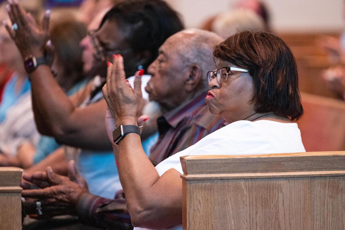 Estella Williams, the President of the Fort Worth/Tarrant County NAACP, reacts to a statement from Rev. Ryon Price, the Senior Pastor of Broadway Baptist Church, during the Pastors for Texas Children Town Hall Call to Action at Arlington Heights United Methodist Church in Fort Worth on Wednesday, April 9, 2025.