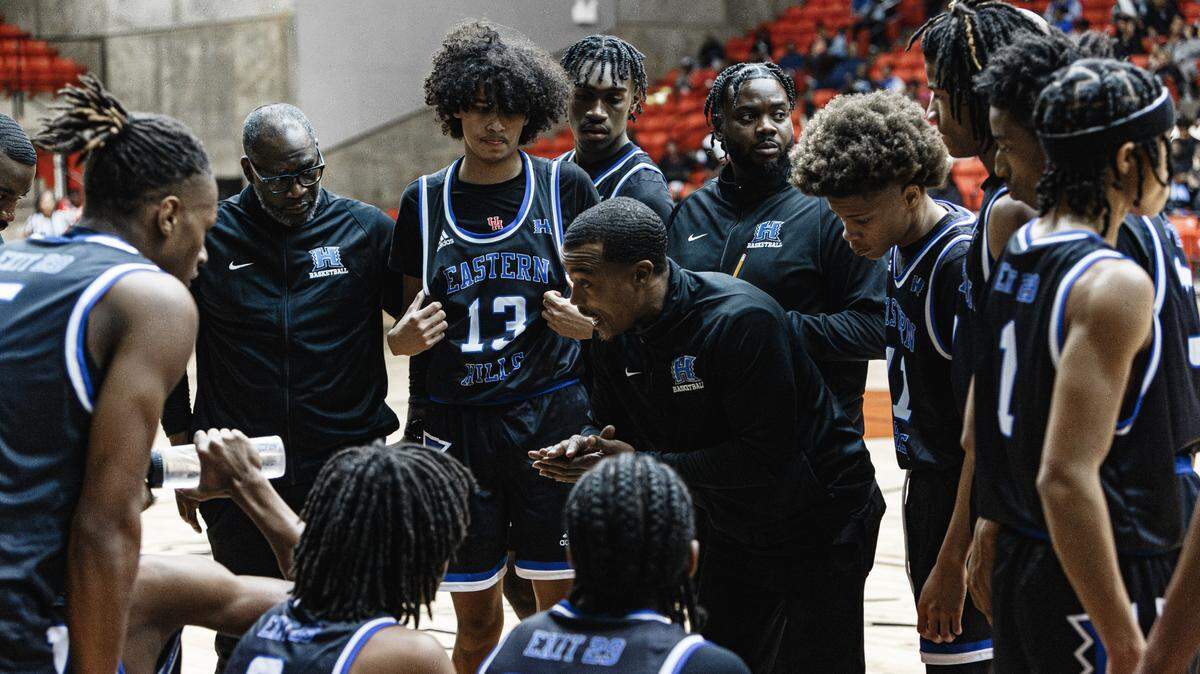 Eastern Hills head coach Melvin Miller talks with his team in a district game against Fort Worth Dunbar on Jan. 2.