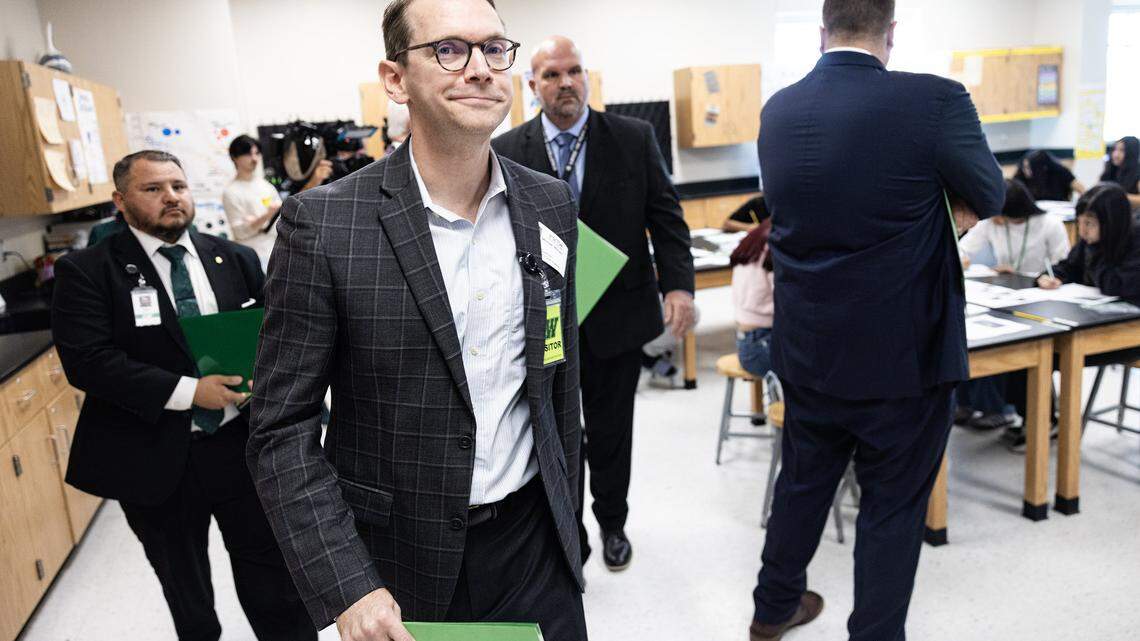 Mike Morath, the Texas Commissioner of Education, walks through a science class at Lucyle Collins Middle School in Lake Worth on Tuesday, Oct. 21, 2025. 