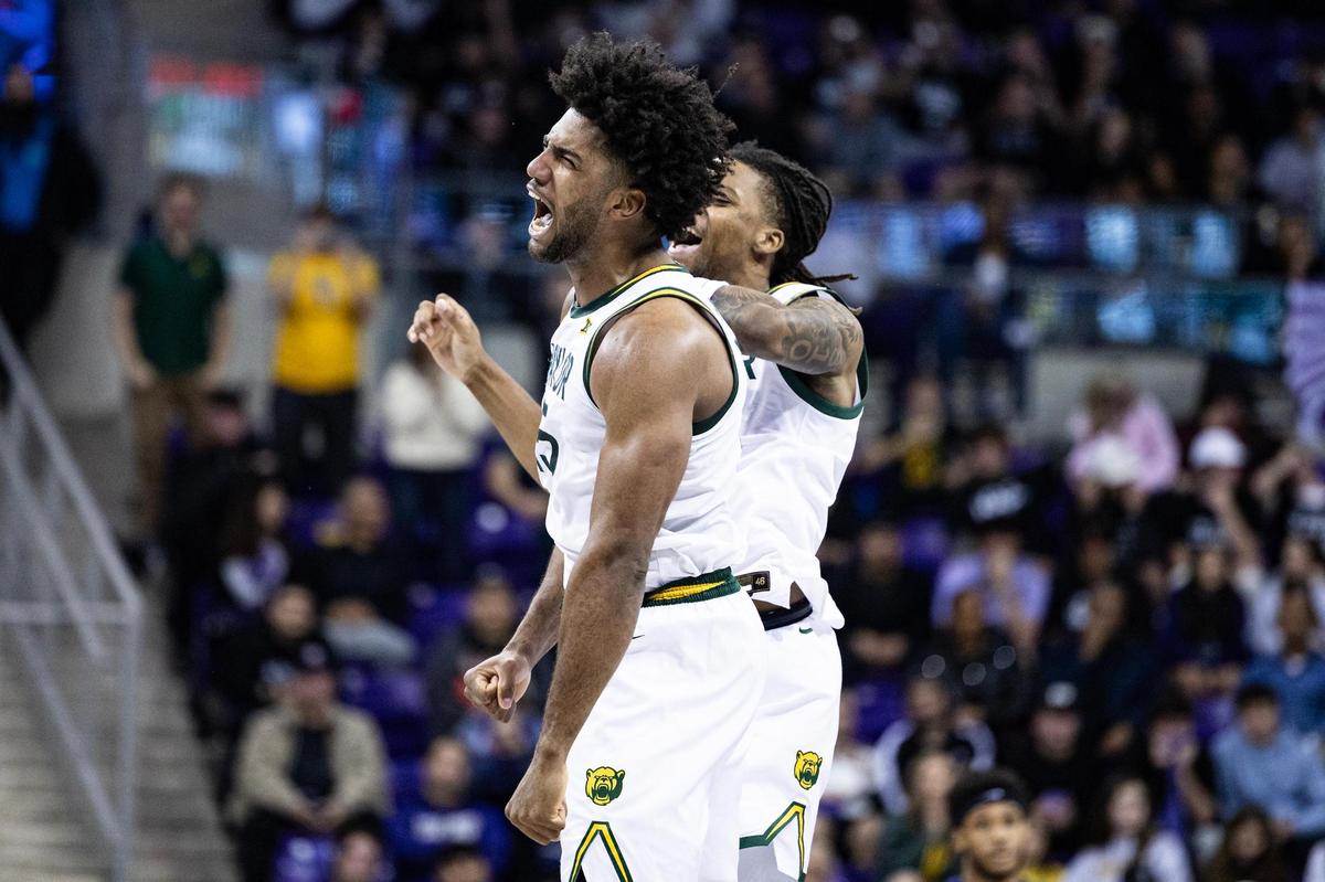 Baylor forward Norchad Omier (15) and guard Jayden Nunn (2) celebrate after Omier hit his second straight three-point shot in the second half of an NCAA game between TCU and Baylor at Schollmaier Arena in Fort Worth on Tuesday, March 4, 2025.