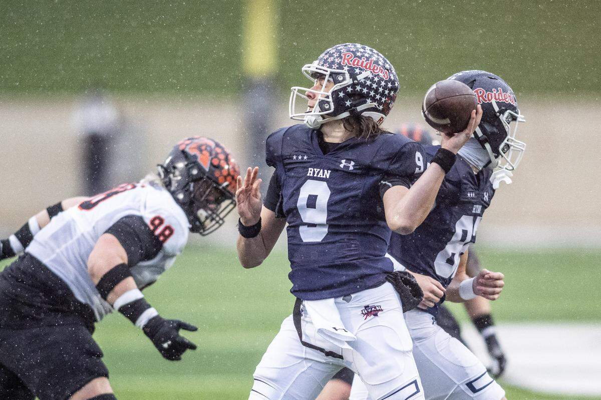 Denton Ryan quarterback Quin Henigan (9) throws a pass against Aledo in a Class 5A Division 1 state quarterfinal on Saturday, Dec. 7, 2024 at Crowley ISD Multi-Purpose Stadium in Fort Worth, Texas.