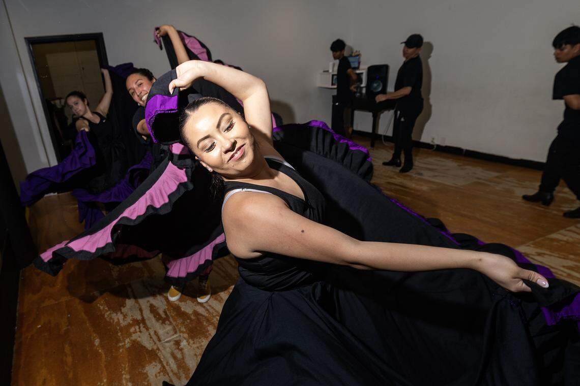 Joanna Gonzales practices the choreography with other members of Ballet Folklorico Azteca de Fort Worth at La Gran Plaza.