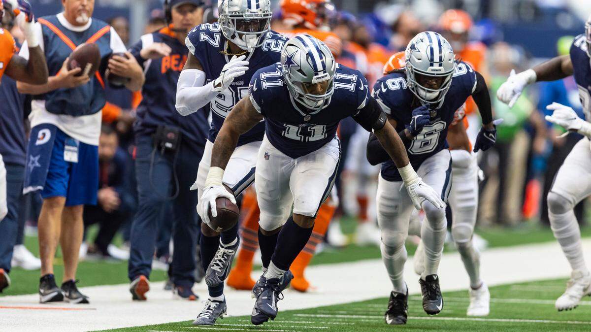 Dallas Cowboys linebacker Micah Parsons (11) recovers a Chicago Bears fumble and returns it for a touchdown on Oct. 30 at AT&T Stadium.