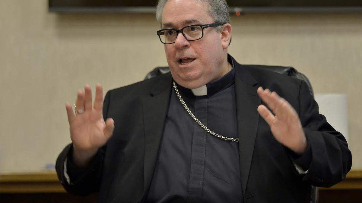 Bishop Michael Olson, pictured during a 2018 interview, said he was “surprised and overwhelmed” by the selection of the first American pope.