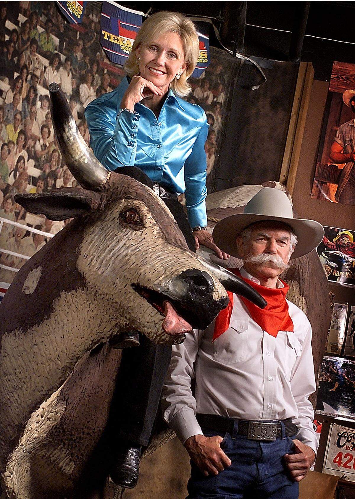 June 17, 2003: Pam Minick, left, and Steve Murrin pose at the rodeo photography booth at Billy Bob’s Texas.
