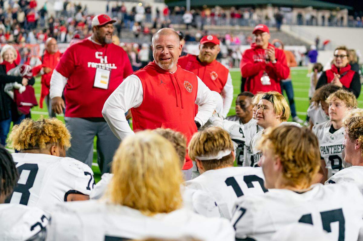 Colleyville Heritage head coach Jerry Edwards speak to his team after a playoff victory against Argyle.