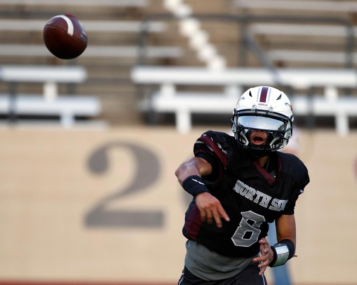 North Side quarterback Kevin Ortega (8) tosses to the outside in the first half of a UIL football game at Farrington Field in Fort Worth,Texas, Friday Sept. 01, 2023. North Side led 14-7 at the half. (Special to the Star-Telegram Bob Booth)