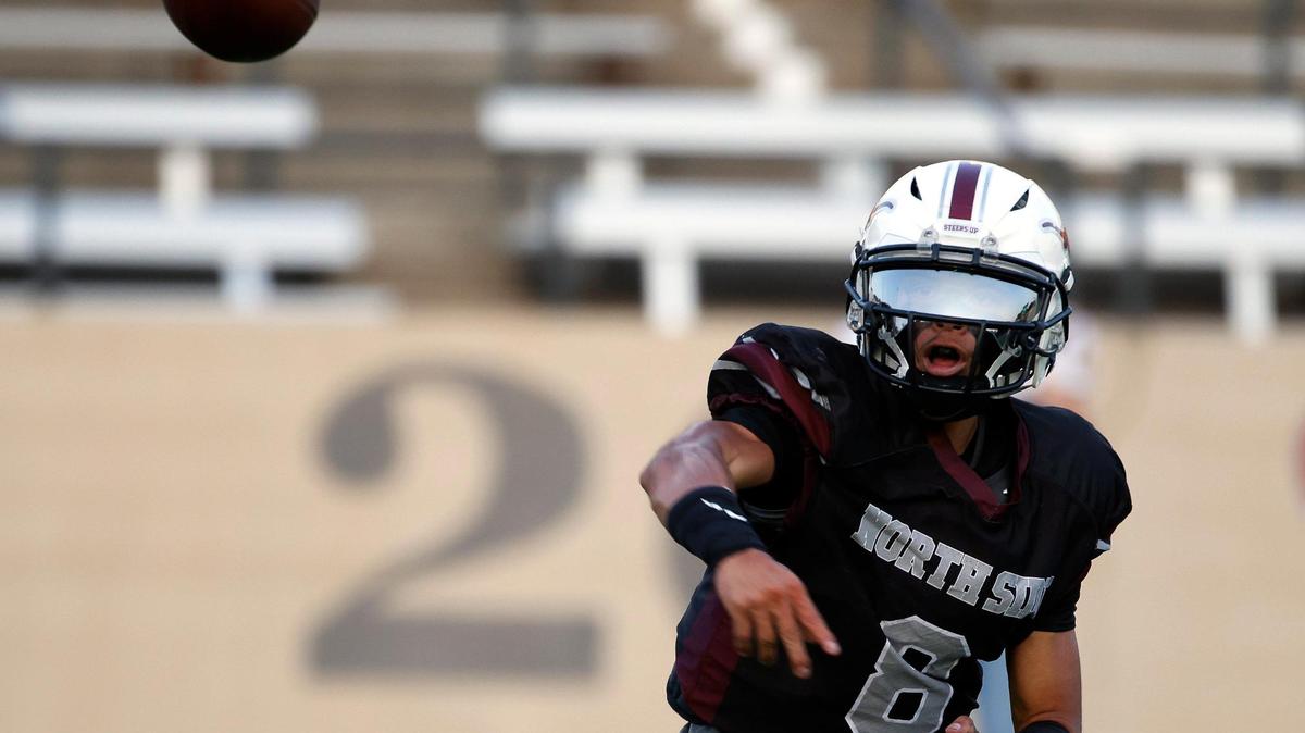 North Side quarterback Kevin Ortega (8) tosses to the outside in the first half of a UIL football game at Farrington Field in Fort Worth,Texas, Friday Sept. 01, 2023. North Side led 14-7 at the half. (Special to the Star-Telegram Bob Booth)