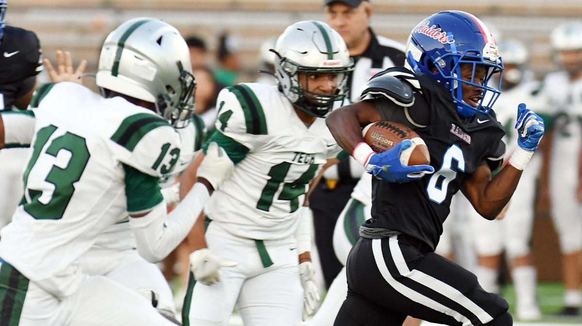 Trimble Tech’s Colton Brookins, left, and Leonardo Lucero chase Southwest’s Jamarion Bell as he breaks away for a 35 yard touchdown run to take a 7-0 lead in the first quarter of Thursday’s September 29, 2022 District 4-5A Division2 football game at Clark Stadium in Fort Worth, Texas. Special/Bob Haynes