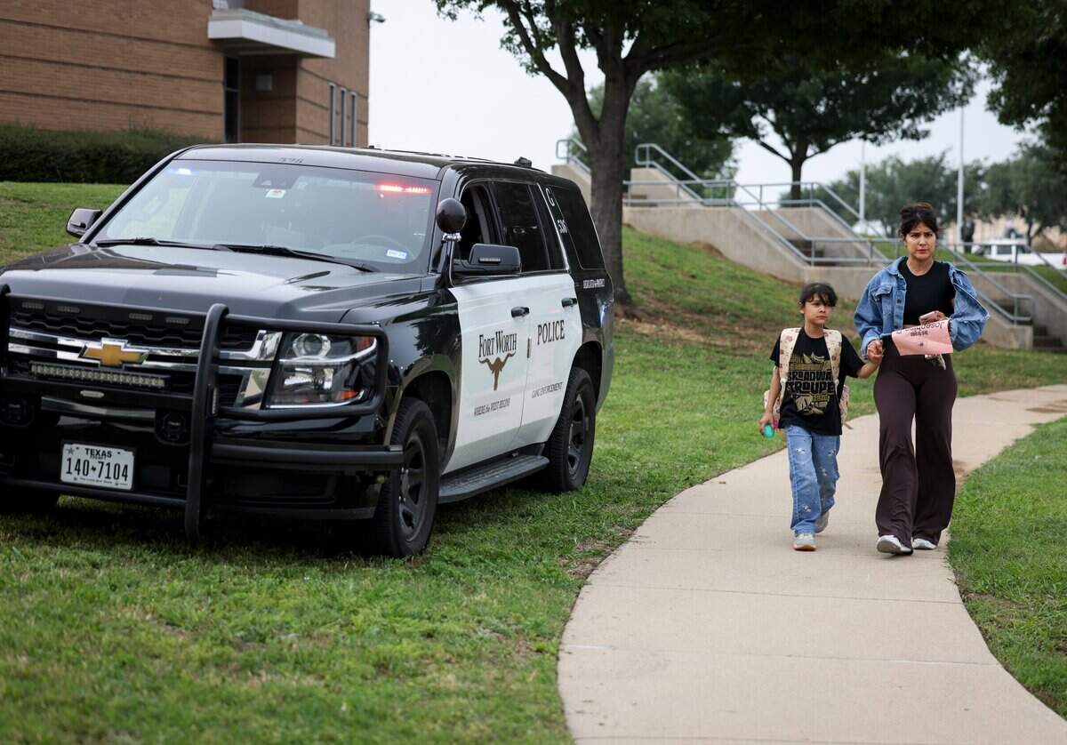 Maria Hernandez picks up her third-grader, Josephine Perez, from Basswood Elementary School after the school was on lockdown due to a shooting-incident in a nearby neighborhood on Tuesday, April 28, 2026 in Fort Worth, Texas.