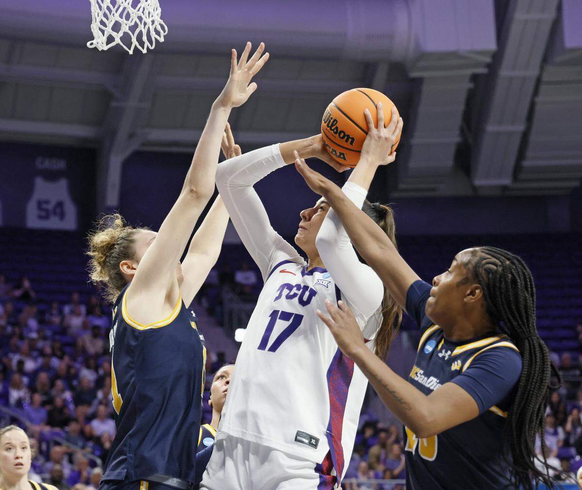 TCU center Clara Silva (17) draws a UC San Diego double team during the first half of an NCAA Division I Women's Basketball Championship game at Schollmeier Arena in Fort Worth, Texas, Friday, March, 20, 2026.