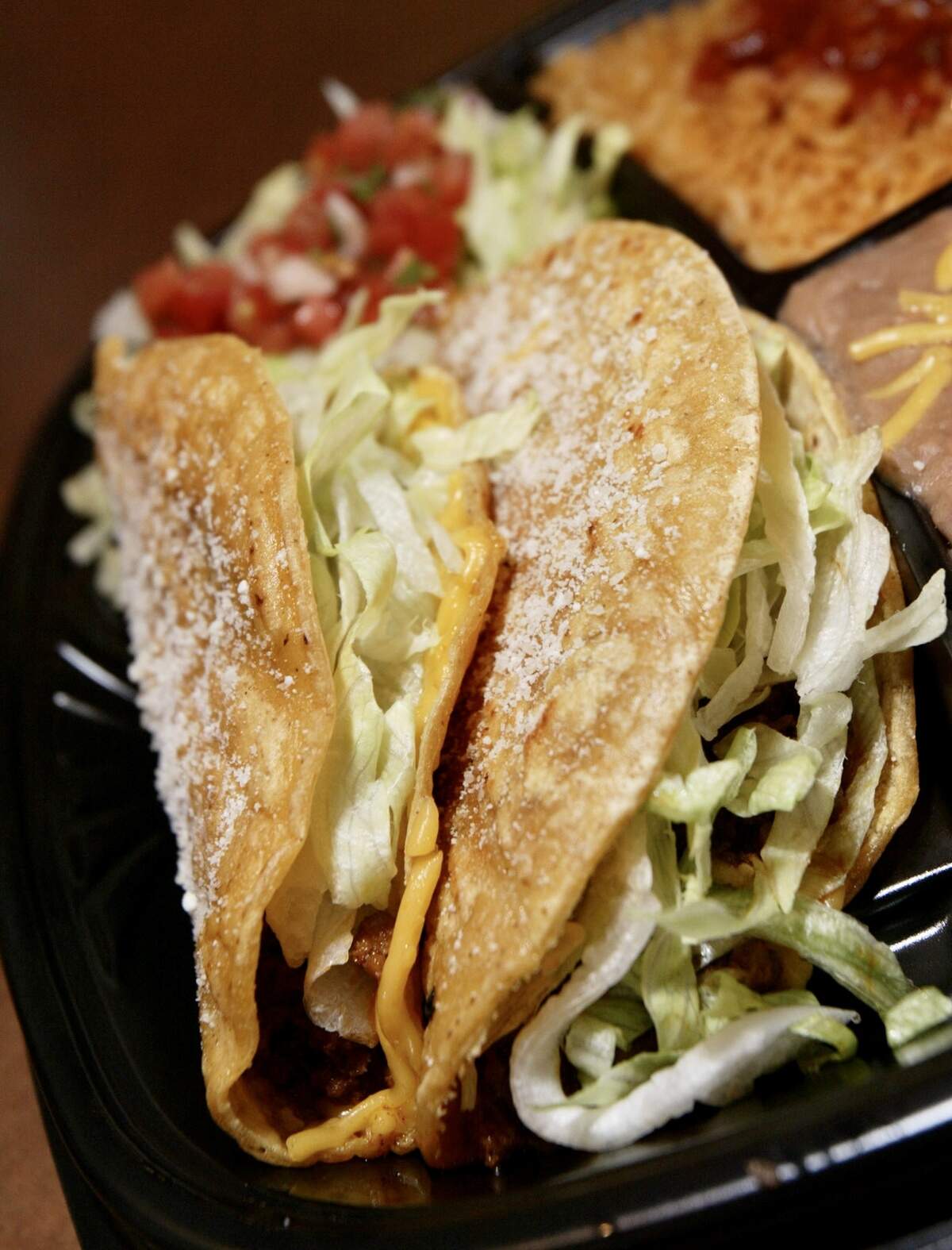 A dusting of Parmesan cheese can be found on tacos from Jimboy’s.