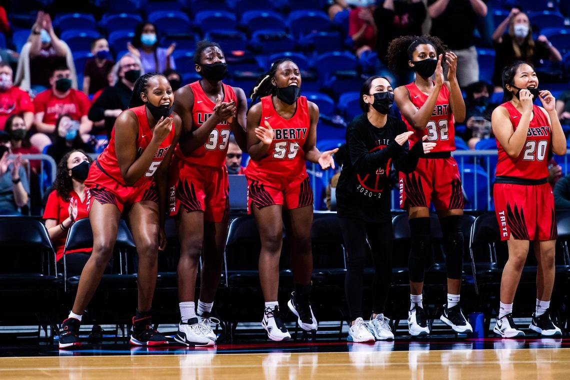 The Redhawks bench erupts in cheer as the 5A state final between Frisco Liberty and Cedar Park becomes a one possession game at the Alamodome in San Antonio Texas, on March 10, 2021. Cedar Park went on to win 46-39. (Photo by Matt Smith. Special to the Star-Telegram).