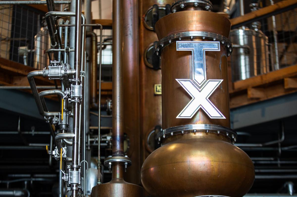A copper pipe at TX Whiskey Ranch in Fort Worth Texas. The distillery invites guests for tours of the distillation process as well as tasting events and a variety of activities.