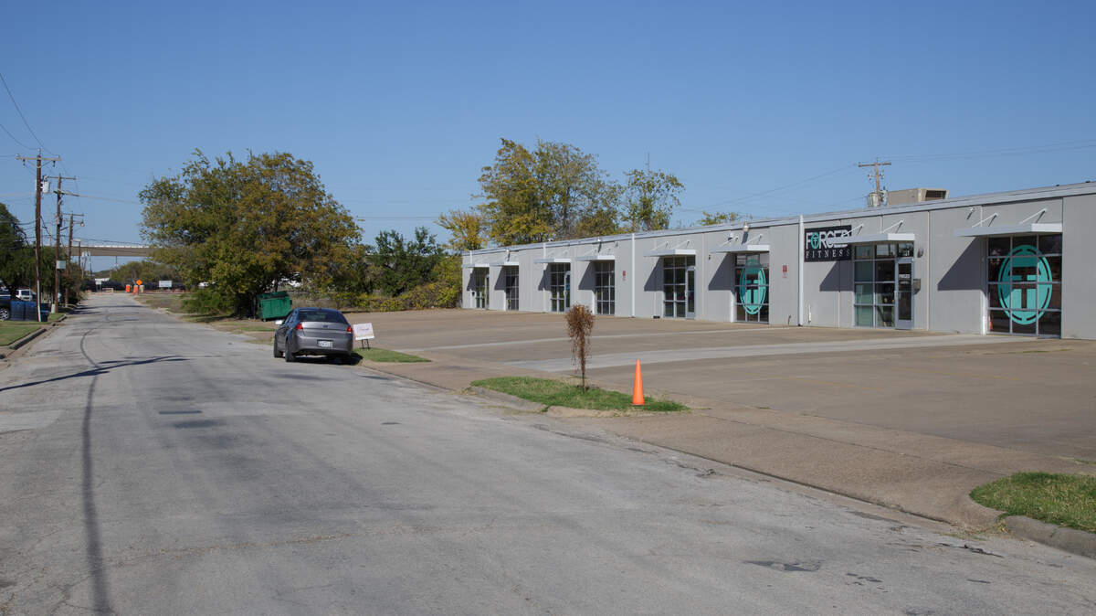 The board will vote on whether to authorize the purchase of a little more than half an acre of Greenleaf Street to make way for the channel running beneath the recently completed White Settlement and Henderson Street bridges.