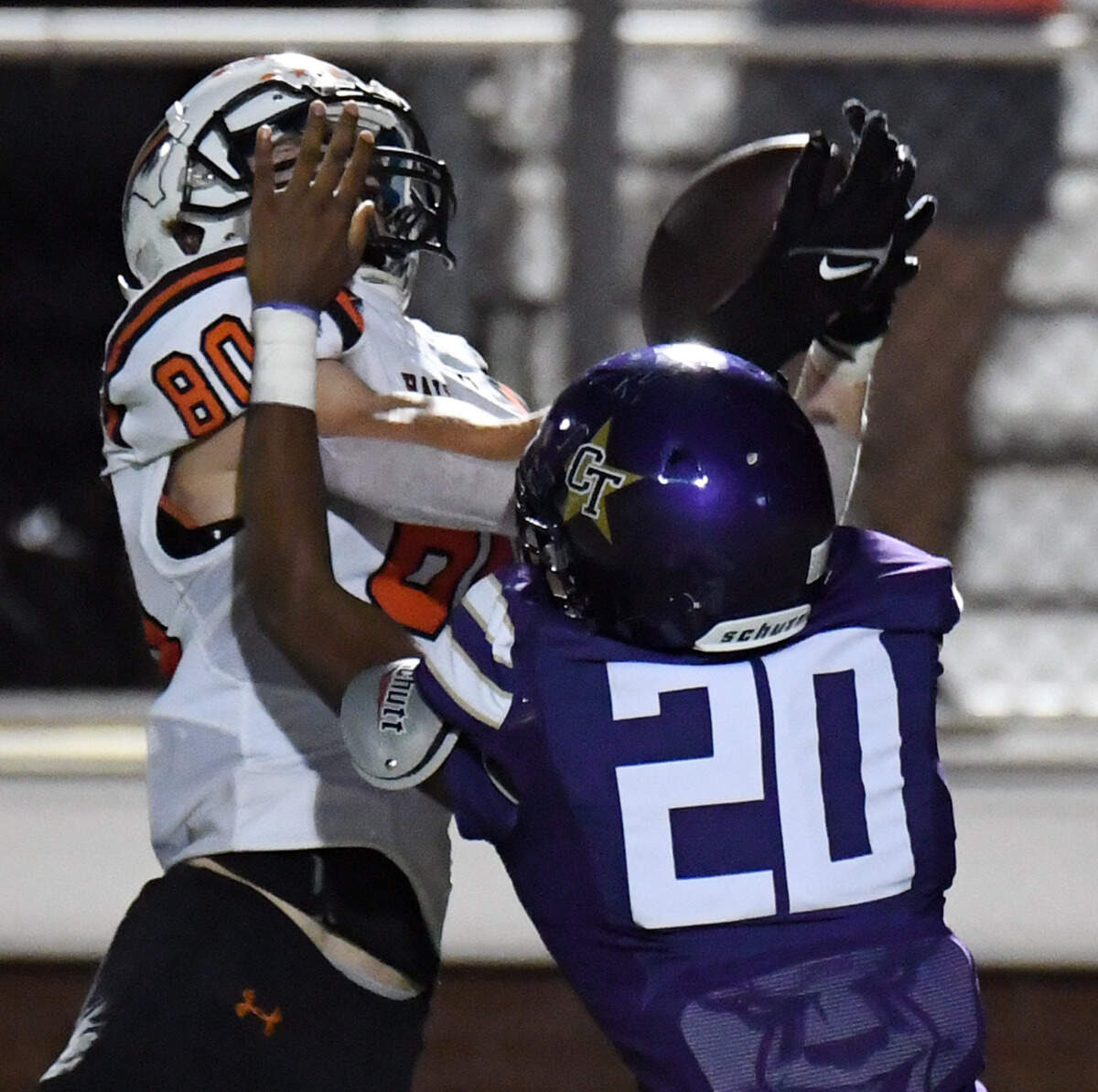 Haltom’s Jerimiah Sanders, left bings down a catch for a touchdown to take a 36-8 lead as Chisholm Trail’s Kiwi Gonzales tries to defend in the fourth quarter of their district 3-6A football game Friday, September 17, 2021 at Chisholm Trail High School in Saginaw, Texas. Special/Bob Haynes