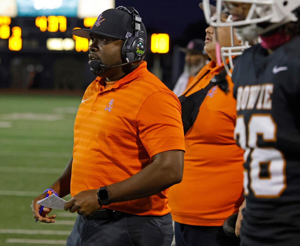Bowie head coach Joseph Sam watches second quarter action during a District 8-6A football game at C.H. Wilemon Field in Arlington, Texas, Friday, Oct. 18, 2024.