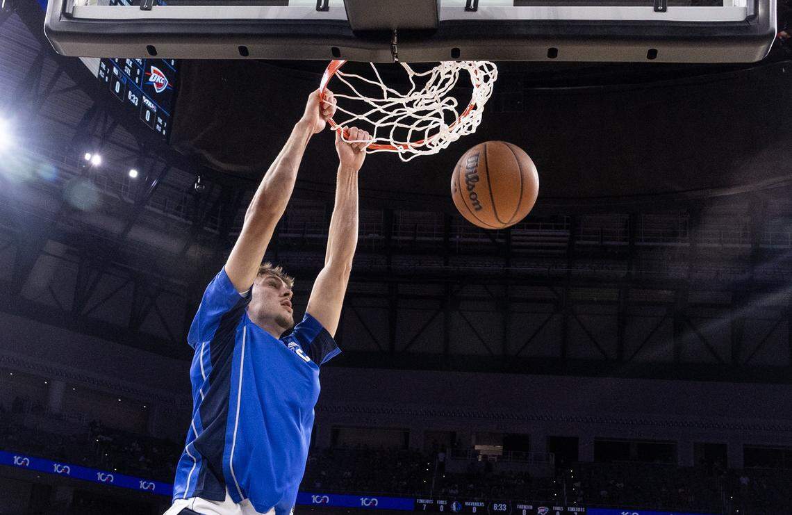 Mavericks forward Cooper Flagg warms up prior to the first half of a preseason NBA game between the Dallas Mavericks and Oklahoma City Thunder at Dickies Arena in Fort Worth on Monday, Oct. 6, 2025.