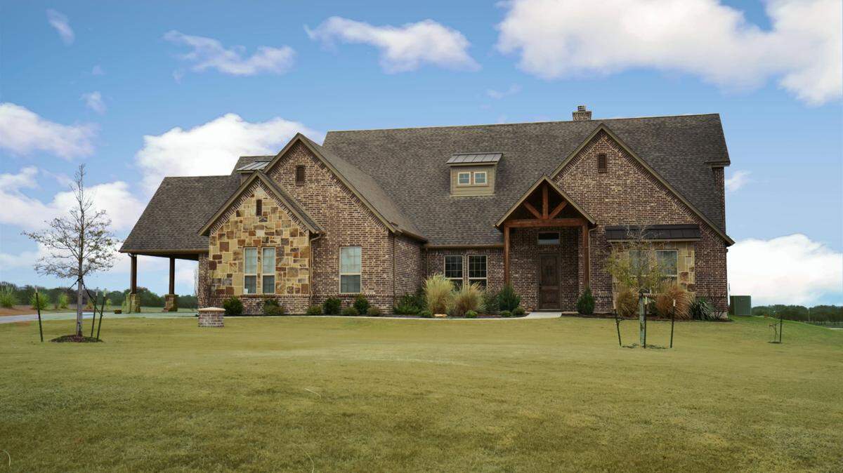The home at 219 Rising Oak Drive is priced $649,000.