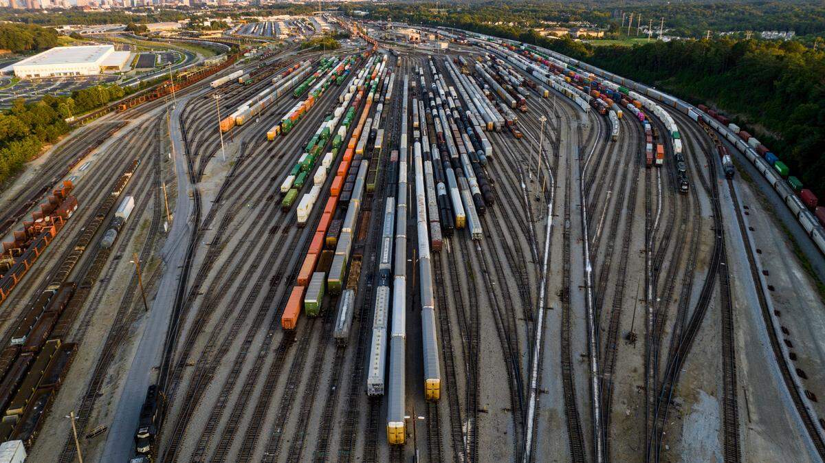 FILE - Freight train cars sit in a Norfolk Southern rail yard on Sept. 14, 2022, in Atlanta. Business groups are increasing the pressure on lawmakers to intervene and block a railroad strike before next month’s deadline in the stalled contract talks. A coalition of more than 400 business groups sent a letter to Congressional leaders Monday, Nov. 28, 2022 urging them to step in because of fears about the devastating potential impact of a strike that could force many businesses to shut down. (AP Photo/Danny Karnik, File)
