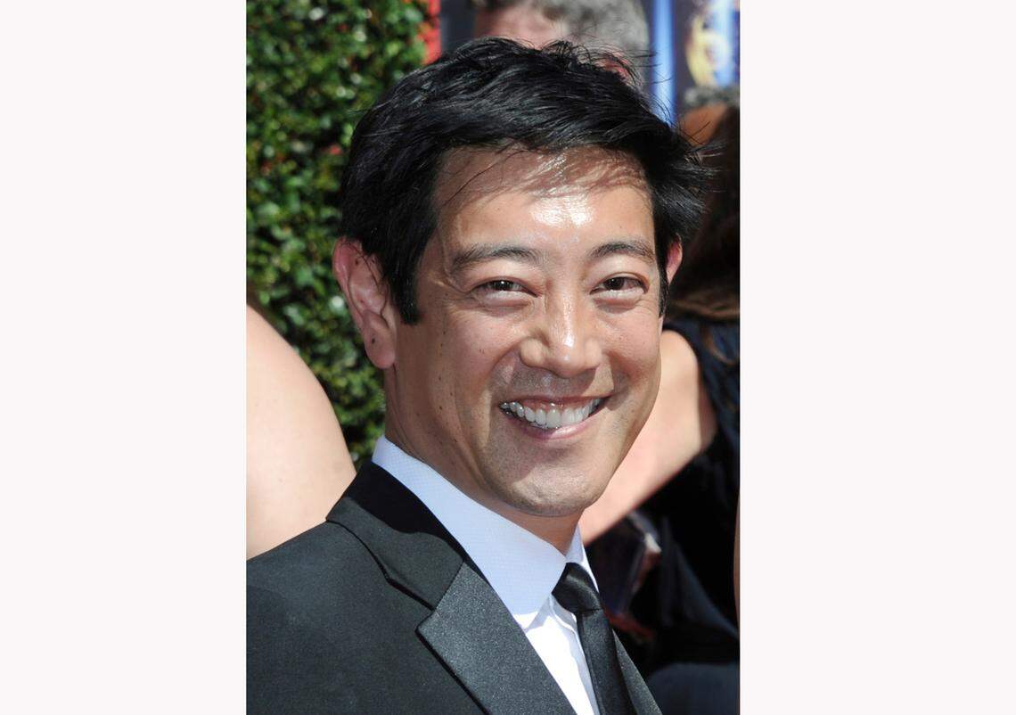 FILE - In this Aug. 16, 2014 file photo, Grant Imahara arrives at the Creative Arts Emmys in Los Angeles. Discovery Channel says the longtime “Mythbusters” host died from a brain aneurysm Monday at the age of 49. The network said he was one of the few trained operators for the famed R2-D2 droid from Star Wars and engineered the Energizer Bunny’s popular rhythmic beat. (Photo by Richard Shotwell/Invision/AP, File)